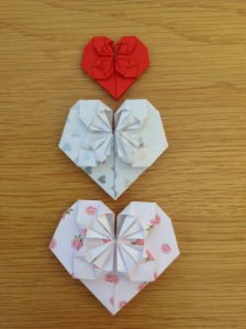 Origami hearts in different papers